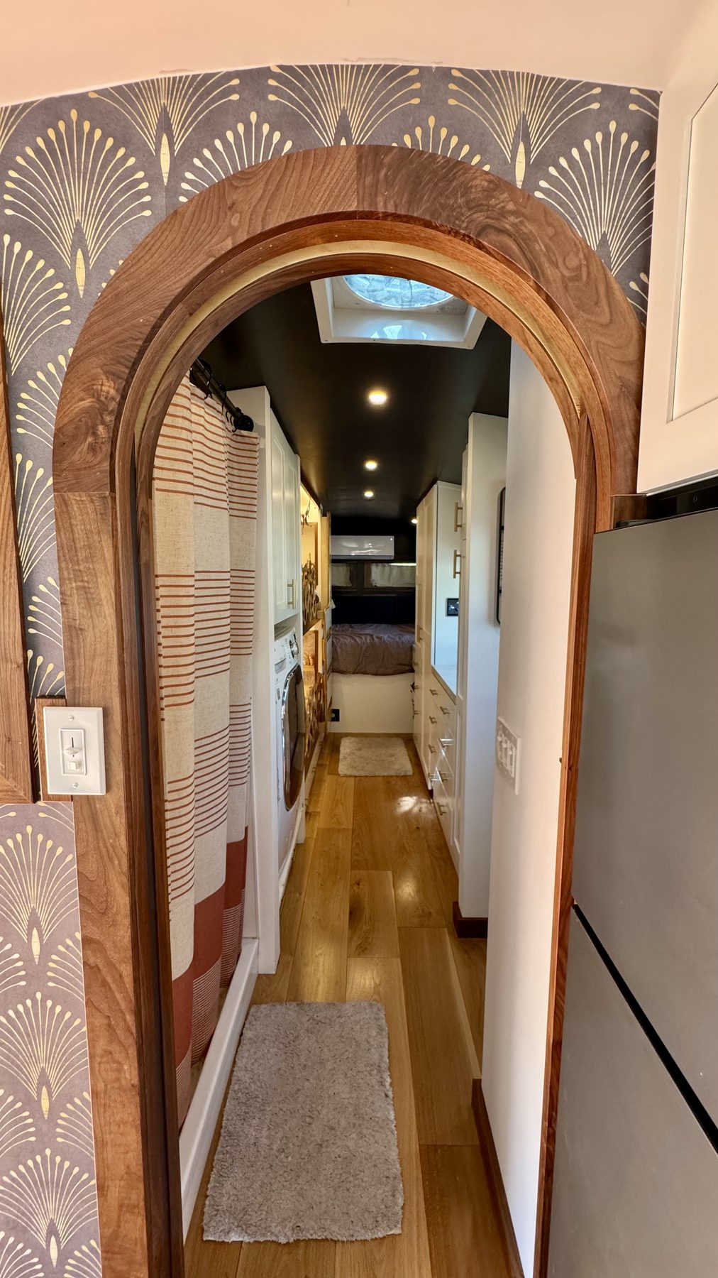 The curved couch area with windows on three sides