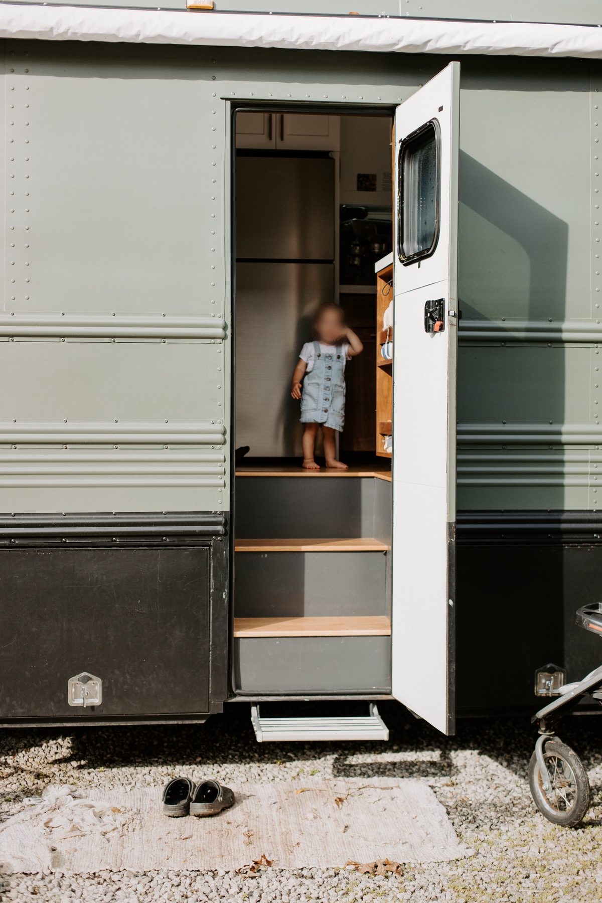 The midship entry door open with steps down
