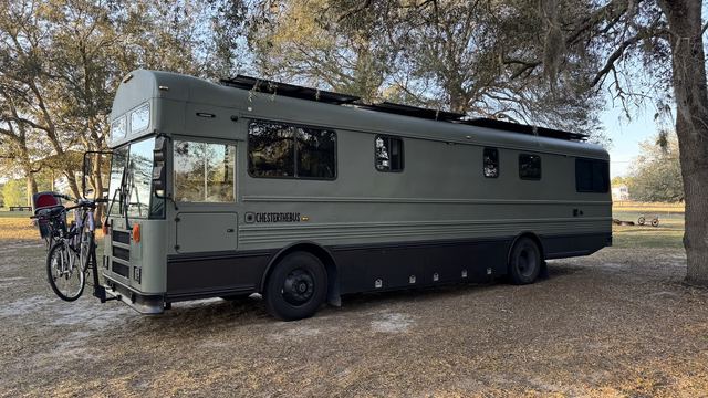 Full side profile under the oaks
