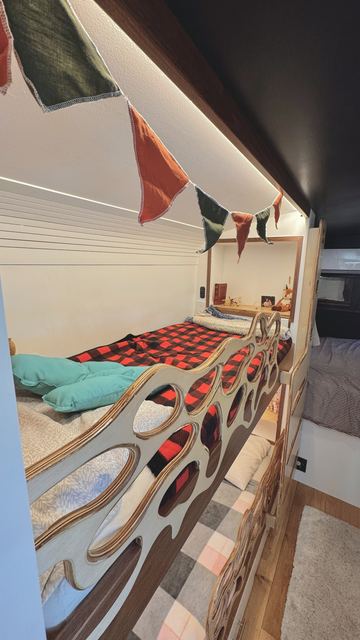 Junior bunks with hand-carved railings