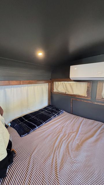Bed and the rear windows